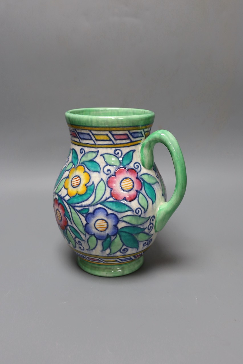A Charlotte Rhead jug, 22 cms high.